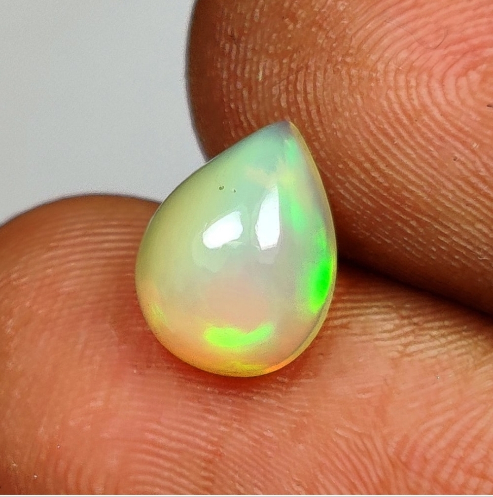 1.22 Ct Natural Multicolor Welo Opal Flash Fire Pear Cab